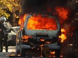 AFP/„Scanpix“ nuotr./Graikijoje per riaušes padegta daugybė automobilių.