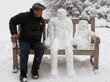 „Reuters“/„Scanpix“ nuotr./Sniegas trukdo net sutarčių pasirašymui