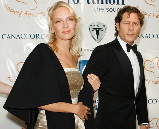 Reuters/Scanpix nuotr./Uma Thurman ir Arpadas Bussonas