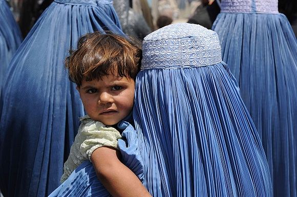 Scanpix nuotr./Moters gyvenimas Afganistane
