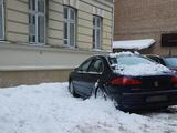 15min.lt skaitytojo Dansu nuotr./Rotundo g. krentantis sniegas apgadino automobilį