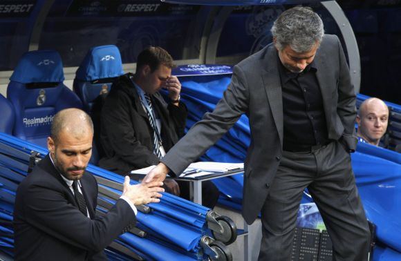 Reuters/Scanpix nuotr./J.Guardiola ir J.Mourinho