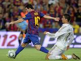 AFP/Scanpix nuotr./Lionelis Messi ir Cristiano Ronaldo (deainėje)