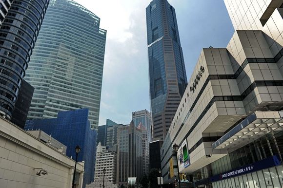 AFP/Scanpix nuotr./Verslo rajonas Singapūre