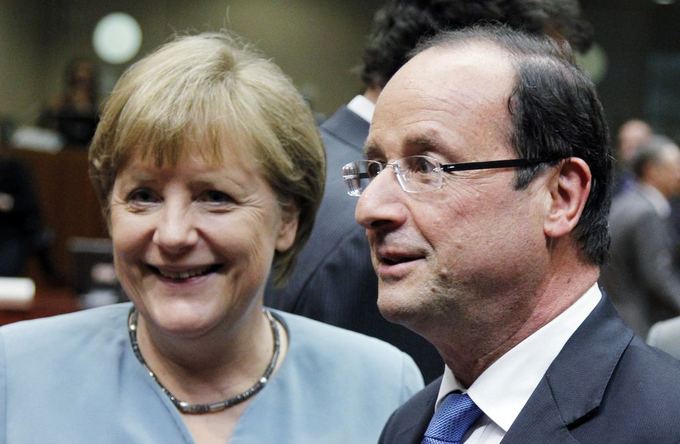 Reuters/Scanpix nuotr./Prancūzijos prezidentas Francois Hollande'as ir Vokietijos kanclerė Angela Merkel.