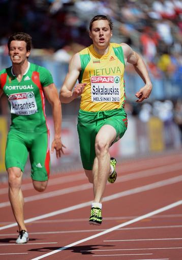 AFP/Scanpix nuotr./Rytis Sakalauskas (deainėje) 100 metrų bėgimo rungtyje
