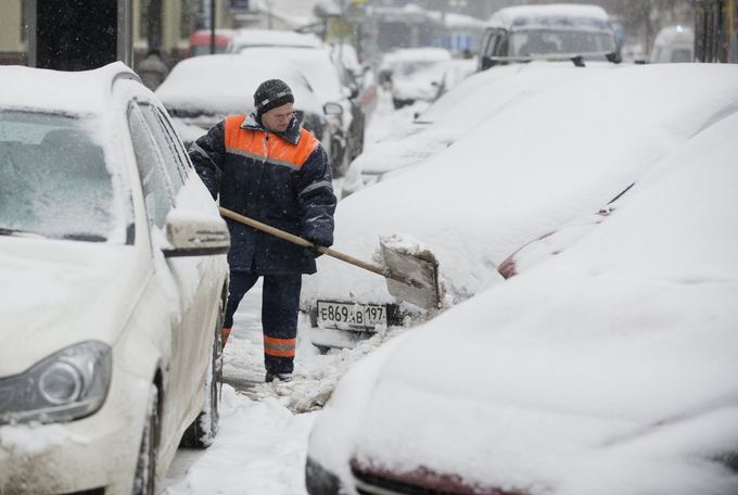 AFP/Scanpix nuotr./Maskvoje valomas sniegas