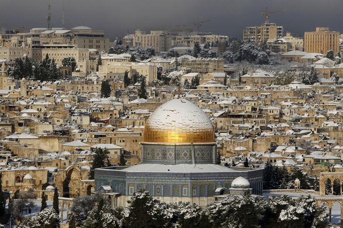 AFP/Scanpix nuotr./Sniegas Izraelyje