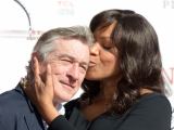 „Scanpix“ nuotr./Robertas De Niro su žmona Grace Hightower