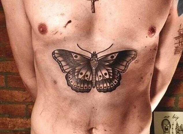 Lyamo Sparkse nuotr./Harry Styleso tatuiruotė