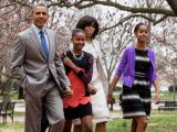 „Scanpix“/„Sipa Press“ nuotr./Barackas Obama su žmone Michelle ir dukromis Sasha bei Malia