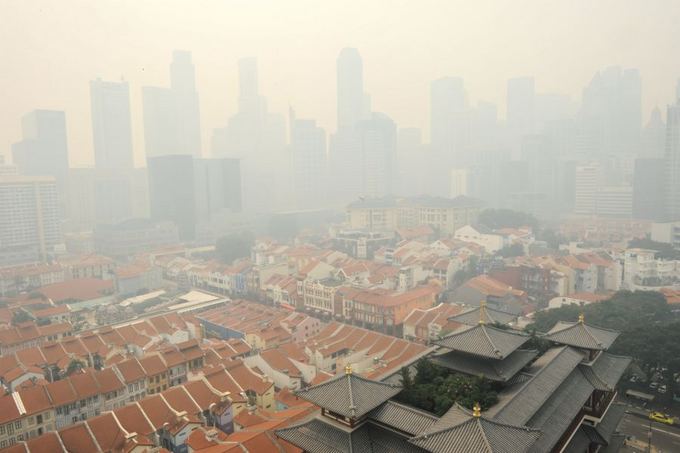 AFP/Scanpix nuotr./Smogas Singapūre
