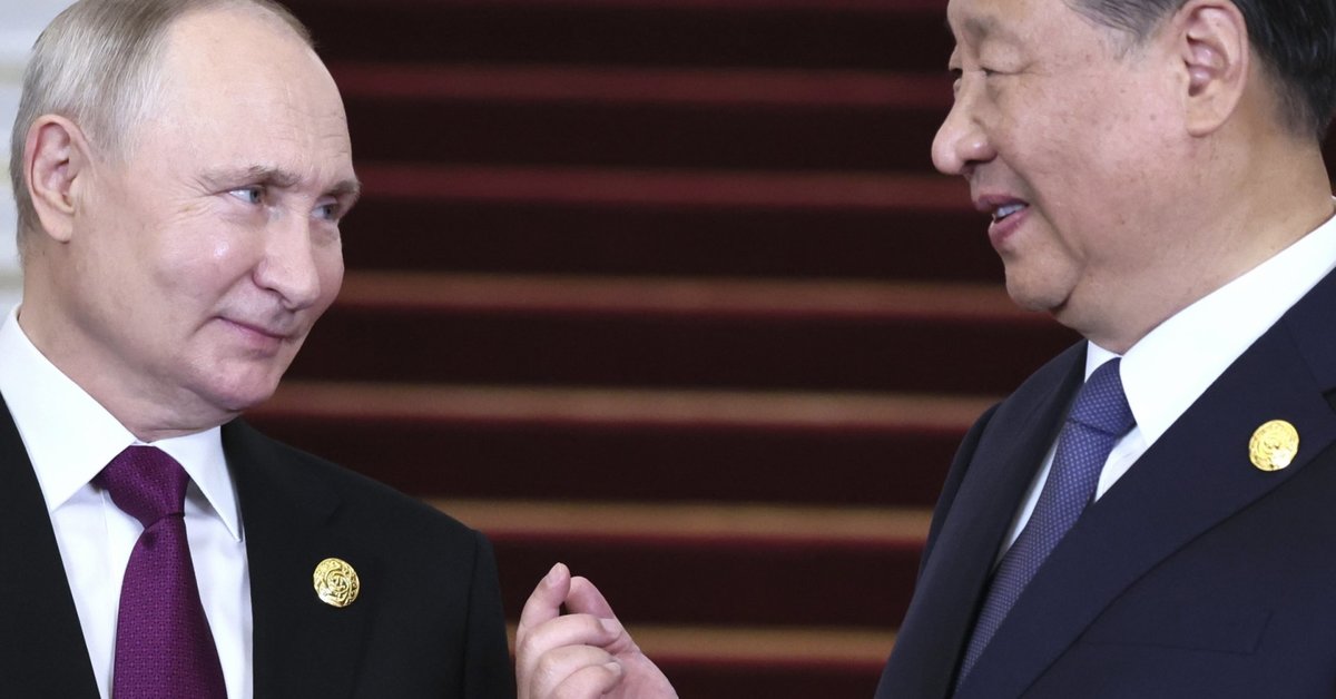 V. Putin, who arrived at the forum in Beijing, was greeted by Xi Jinping, the ministry says