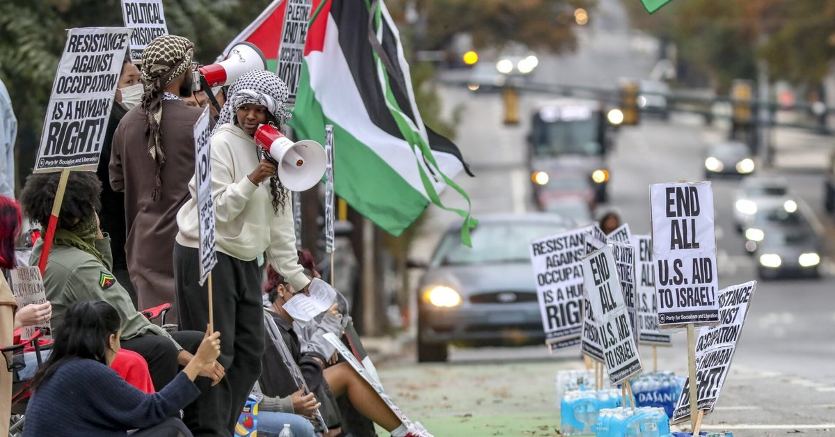 In the US state of Georgia, a protester set himself on fire outside the Israeli consulate