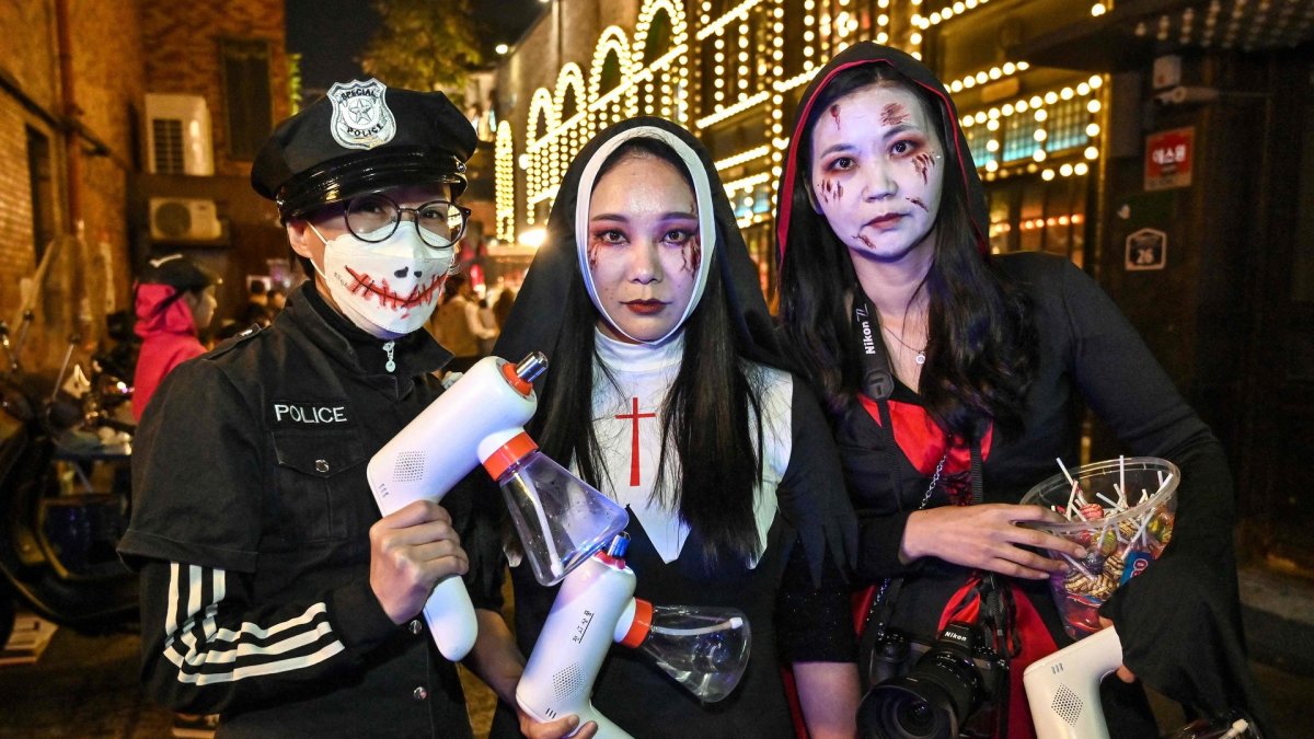 Tragiškai pasibaigusi Helovino šventė Seule / AFP/„Scanpix“ nuotr.