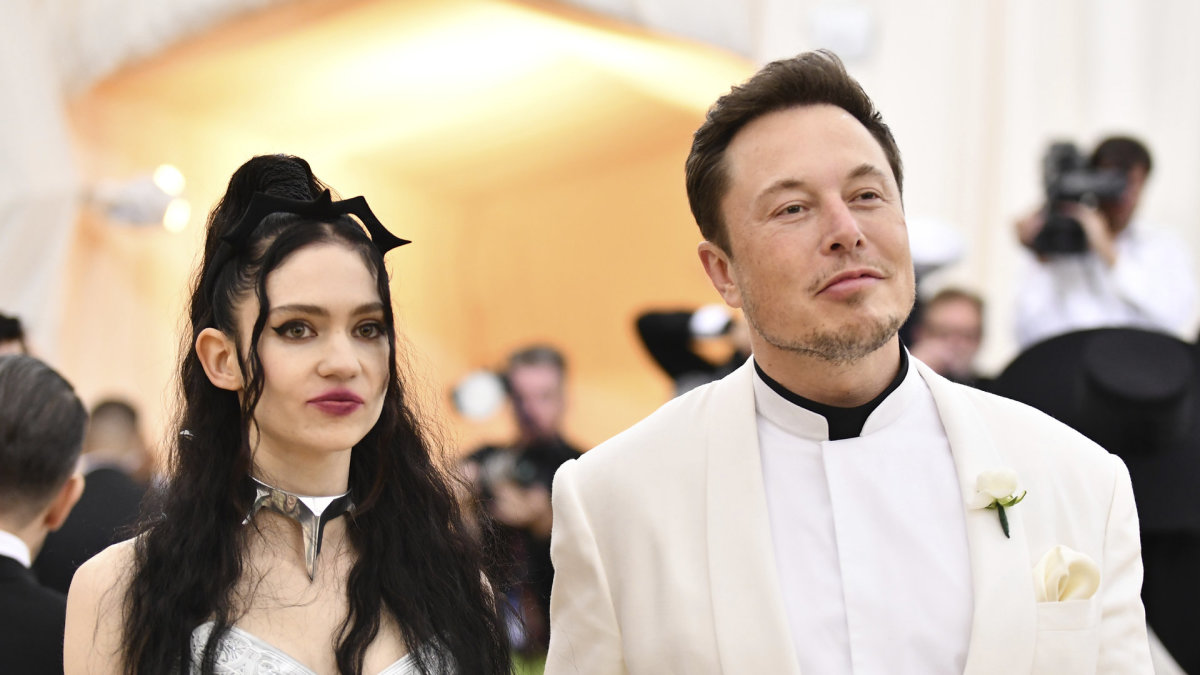 Elonas Muskas ir Grimes / „Scanpix“ nuotr.