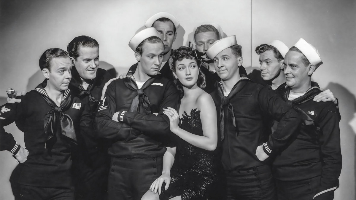 Antrojo pasaulinio karo metais Holivudas pateikė daug tokių filmų – atitrūkusių nuo realybės, bet keliančių jūreivių dvasią: 1942-ųjų „The Fleet’s In“ su Dorothy Lamour centre / Vida Press nuotrauka