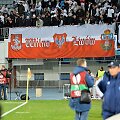 Lenkų futbolo sirgalių i&scaron;keltas plakatas Kijevo stadione