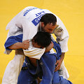 Naidangiinas Tuvshinbayaras (mėlyna apranga) yra laimėjęs Mongolijai pirmąjį olimpinį aukso medalį.