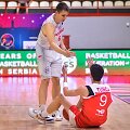 Lenkijos ir Turkijos jaunimo komandų mače žaidėjai nesyk krito ant grindų.