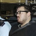 Rurikas Juttingas Honkongo policijos automobilyje 