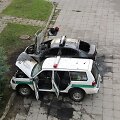 Sudeginti policijos automobiliai