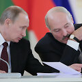 ITAR-TASS: MOSCOW, RUSSIA. DECEMBER 25, 2013. Russia's president Vladimir Putin (L) and Belarusian president Alexander Lukashenko at a meeting of the Russia-Belarus Union State Supreme State Council at Moscow's Kremlin. (Photo ITAR-TASS/ Mikhail Metzel)