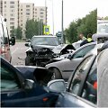 Kaune BMW rėžėsi į stovinčius automobilius