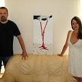 Andrius Užkalnis ir Dovilė Bilk&scaron;tienė su paveikslu 