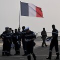 Prancūzijos karinio laivyno jūreiviai po nacionaline vėliava / INDRANIL MUKHERJEE / AFP