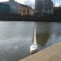 Į Danės upę leisti popieriniai laiveliai. 