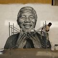 Ant sienos nupie&scaron;tas Nelsonas Mandela