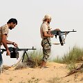 Po Muamaro Kadhafi nuvertimo &scaron;alyje dėl valdžios kovoja įvairios grupuotės.