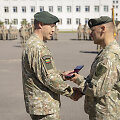P vadas brg. gen. Artūras Radvilas apdovanoja plk. Mindaugą Petkevičių