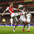 Aaronas Ramsey ir Neilas Tayloras