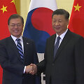 Moon Jae-inas&nbsp;ir Xi Jinpingas
