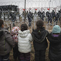 Migrantai Lenkijos pasienyje