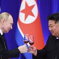 Vladimiras Putinas ir Kim Jong Unas / VLADIMIR SMIRNOV / AFP