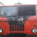 Apdegęs GAZ automobilis