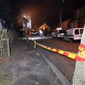 Policija prie namo, kur buvo aptiktos antroji ir trečioji aukos