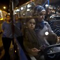 Migrantai autobusais vežami prie sienos su Austrija