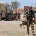 Sirijos Kurdų apsaugos būriai ginasi nuo Islamo valstybės kovotojų