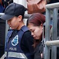 Indonezietė Siti Aishah atvedama į teismo salę