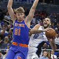 Mindaugas Kuzminskas ir Evanas Fournier