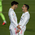 Marco Asensio ir Lucasas Vazquezas