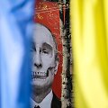 Plakatas su Vladimiro Putino atvaizdu