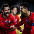 Bernardo Silva ir Cristiano Ronaldo
