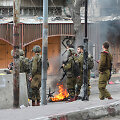 Vakarų Krante palestiniečiai Izraelio pajėgos susiduria su palestiniečių protestais