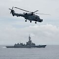 Sraigtasparnis vir&scaron; Pietų Kinijos jūros  / TED ALJIBE / AFP