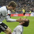 Thomasas Muelleris ir Mario Goetze